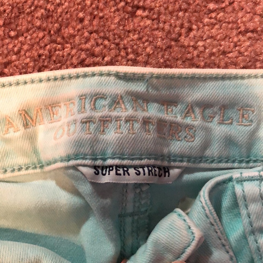 Pastel blue distressed skinny jeans